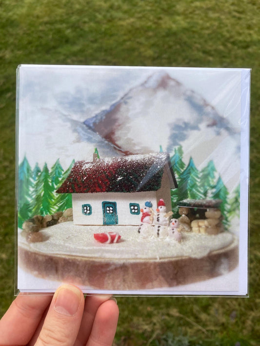 Scottish Highland Winter Bothy with Snowmen Greetings Card